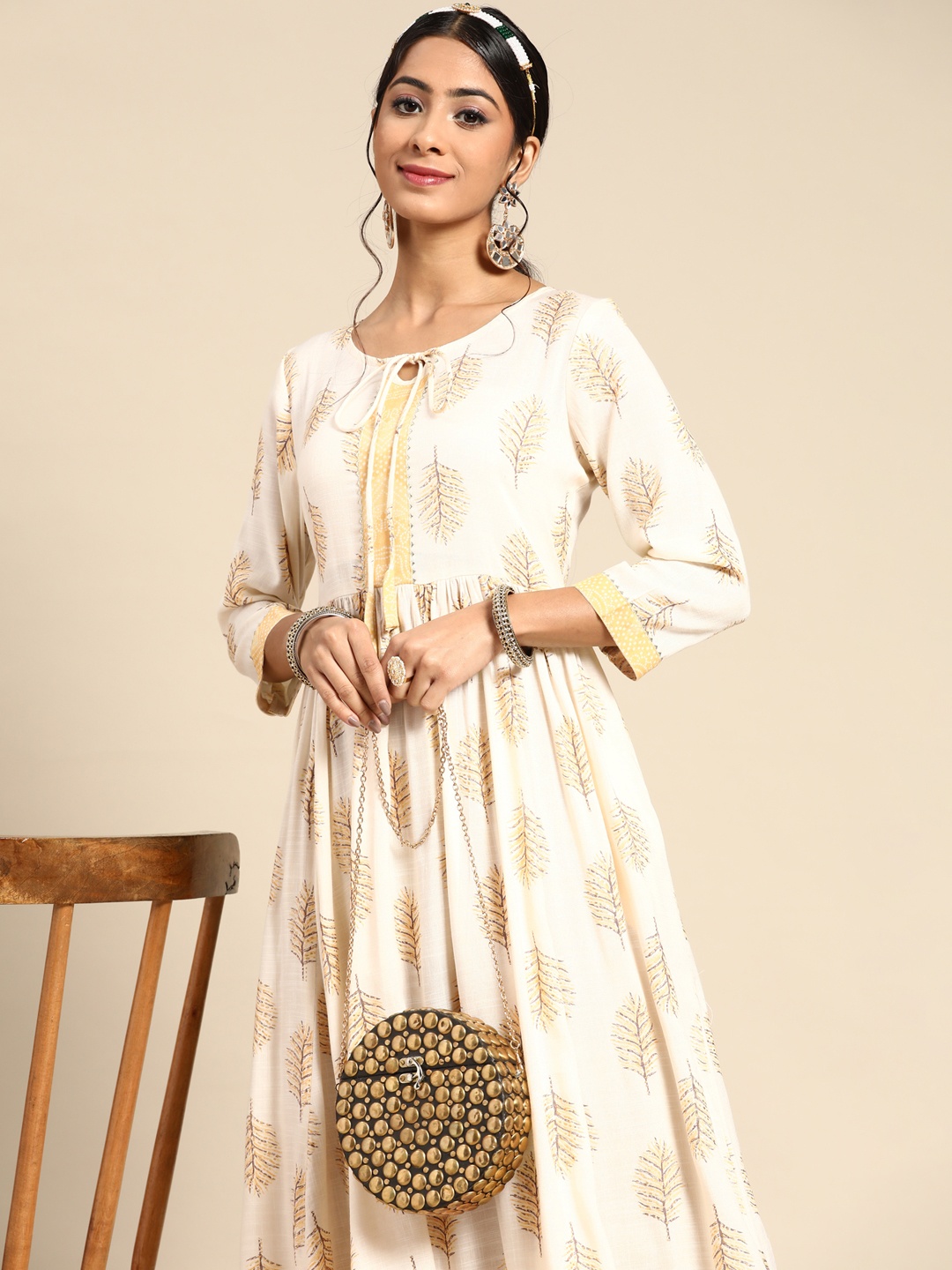 

Sangria Women Off White & Mustard Yellow Ethnic Motifs Printed Pastels Kurta
