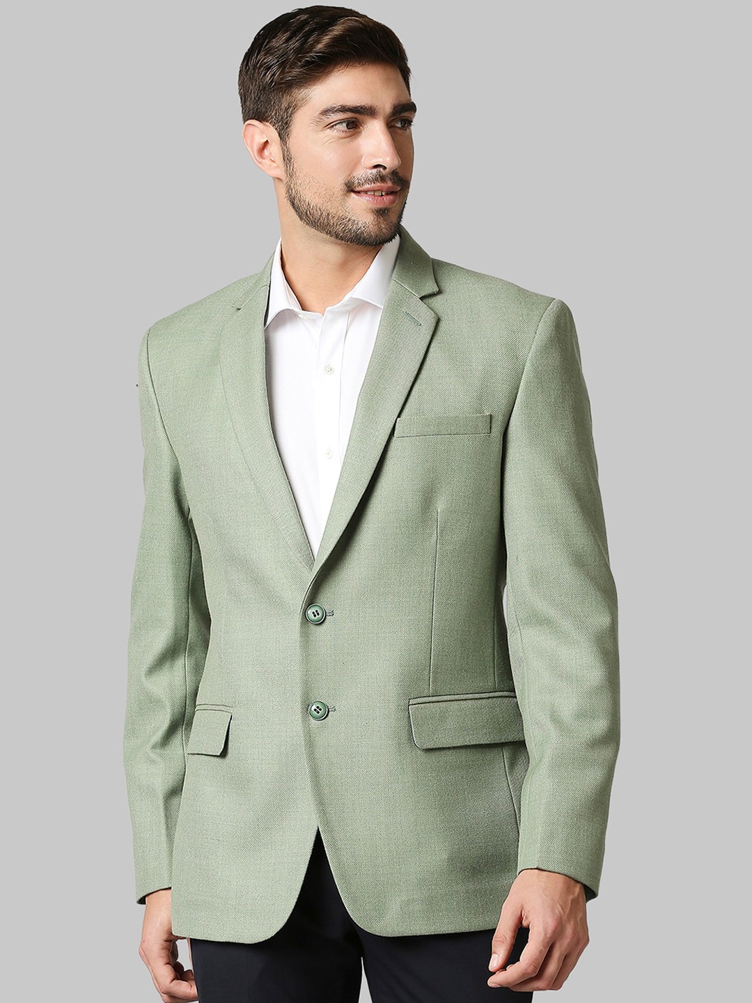 

Raymond Men Green Solid Single-Breasted Formal Blazer