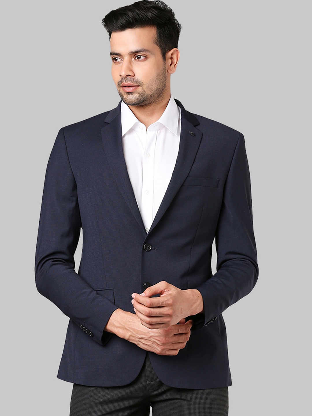 

Raymond Men Dark Blue Solid Single-Breasted Blazers