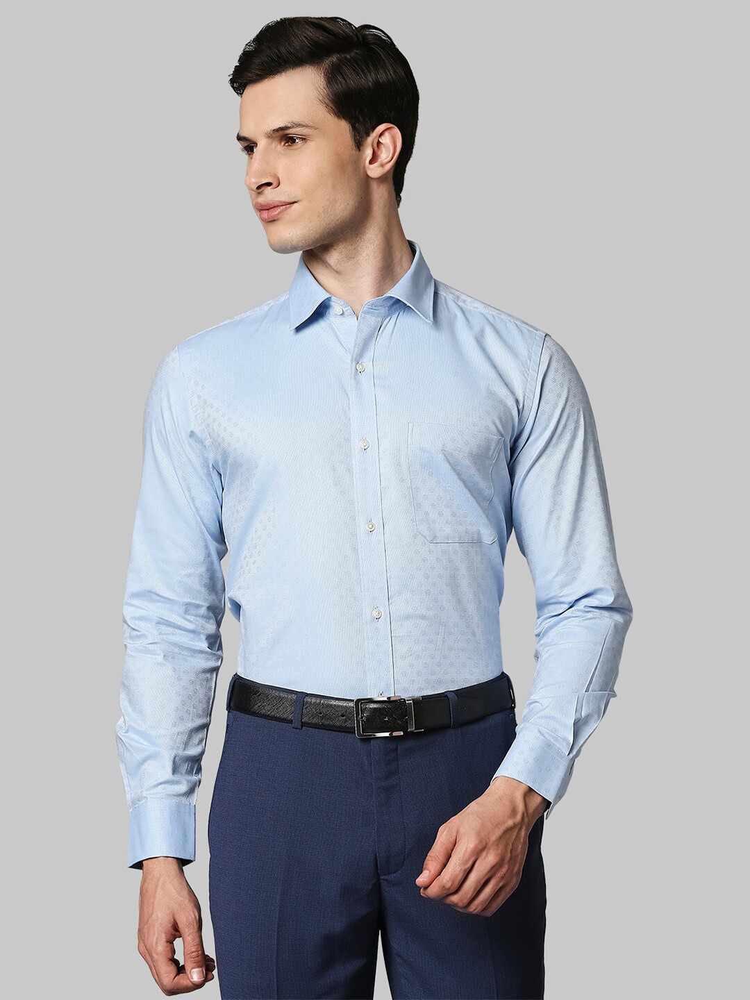

Raymond Men Blue Self Design Cotton Formal Shirts