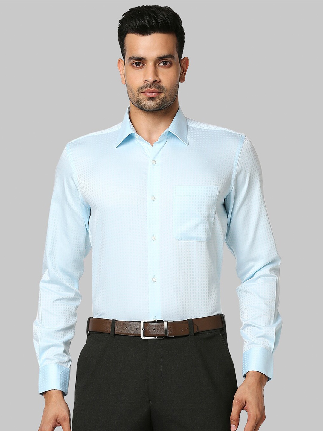 

Raymond Men Blue Self Deign Cotton Formal Shirts