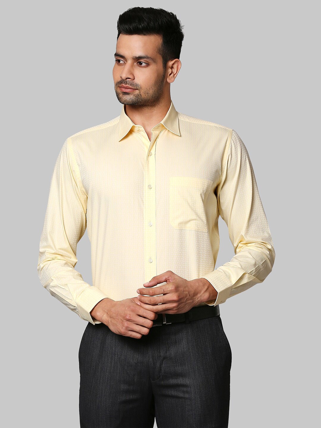 

Raymond Men Yellow Solid Cotton Formal Shirts