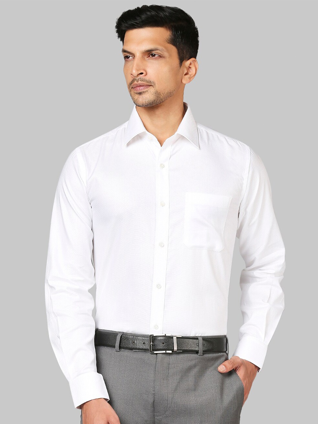 

Raymond Men White Solid Cotton Formal Shirts