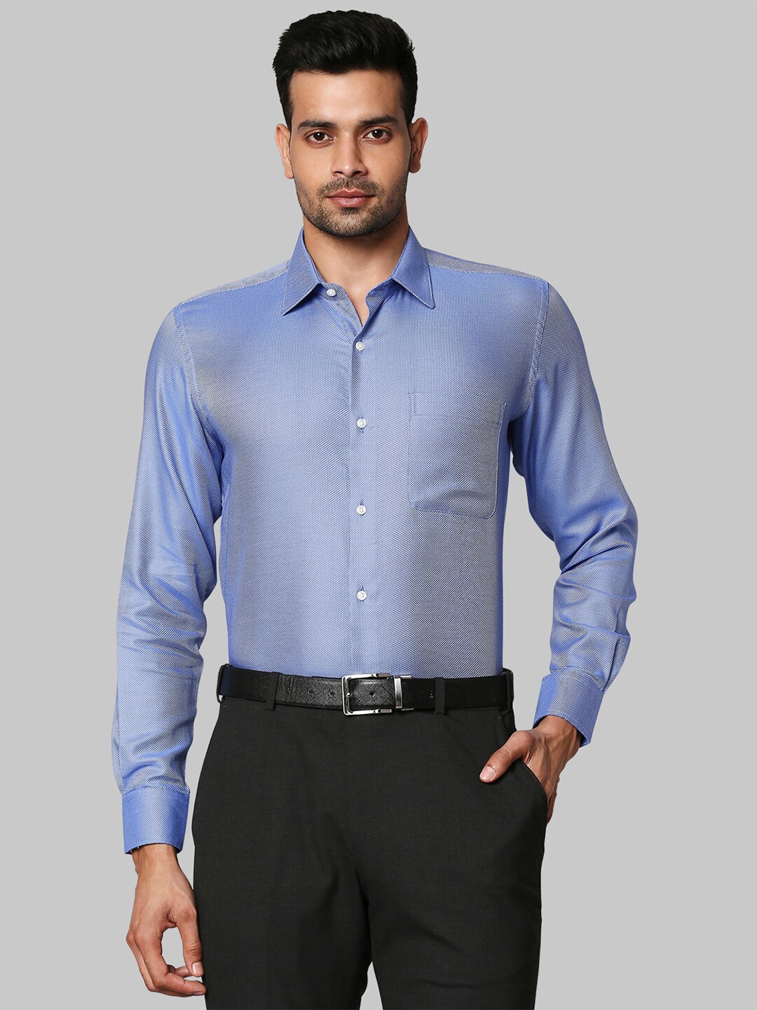 

Raymond Men's Blue Self Design Cotton Shirts