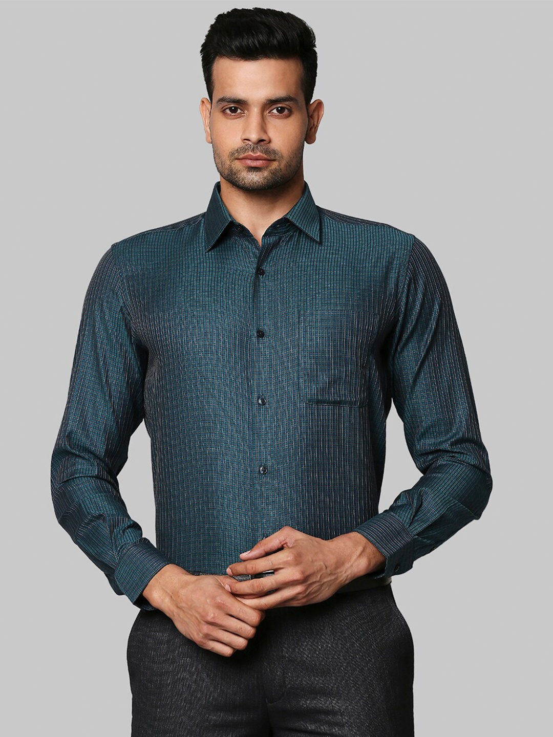 

Raymond Men Green Solid Cotton Shirt