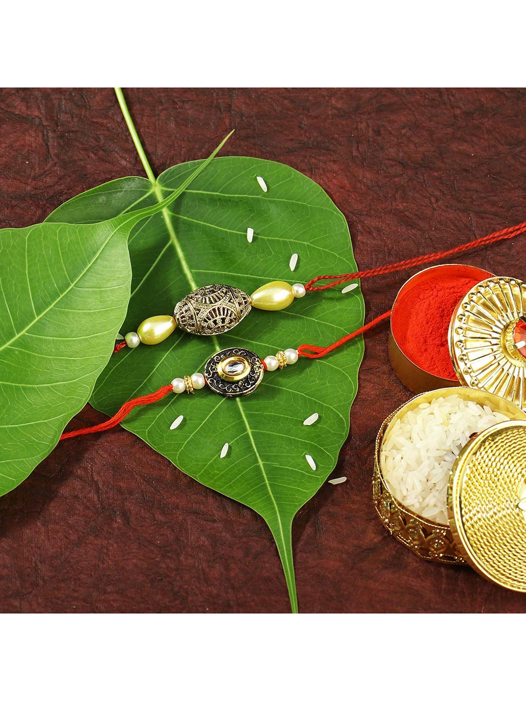 

I Jewels Set Of 2 Gold-Plated Red Pearl & Stone Studded Rakhi with Roli Chawal