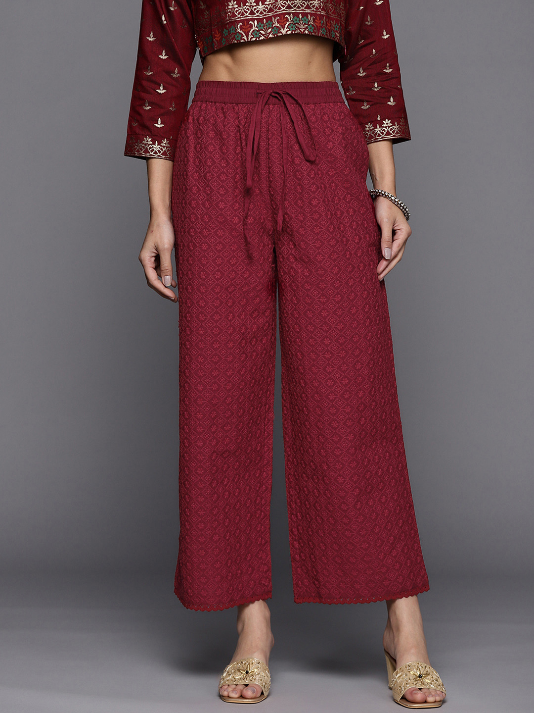 

Libas Women Maroon Ethnic Motifs Embroidered Cotton Ethnic Palazzos
