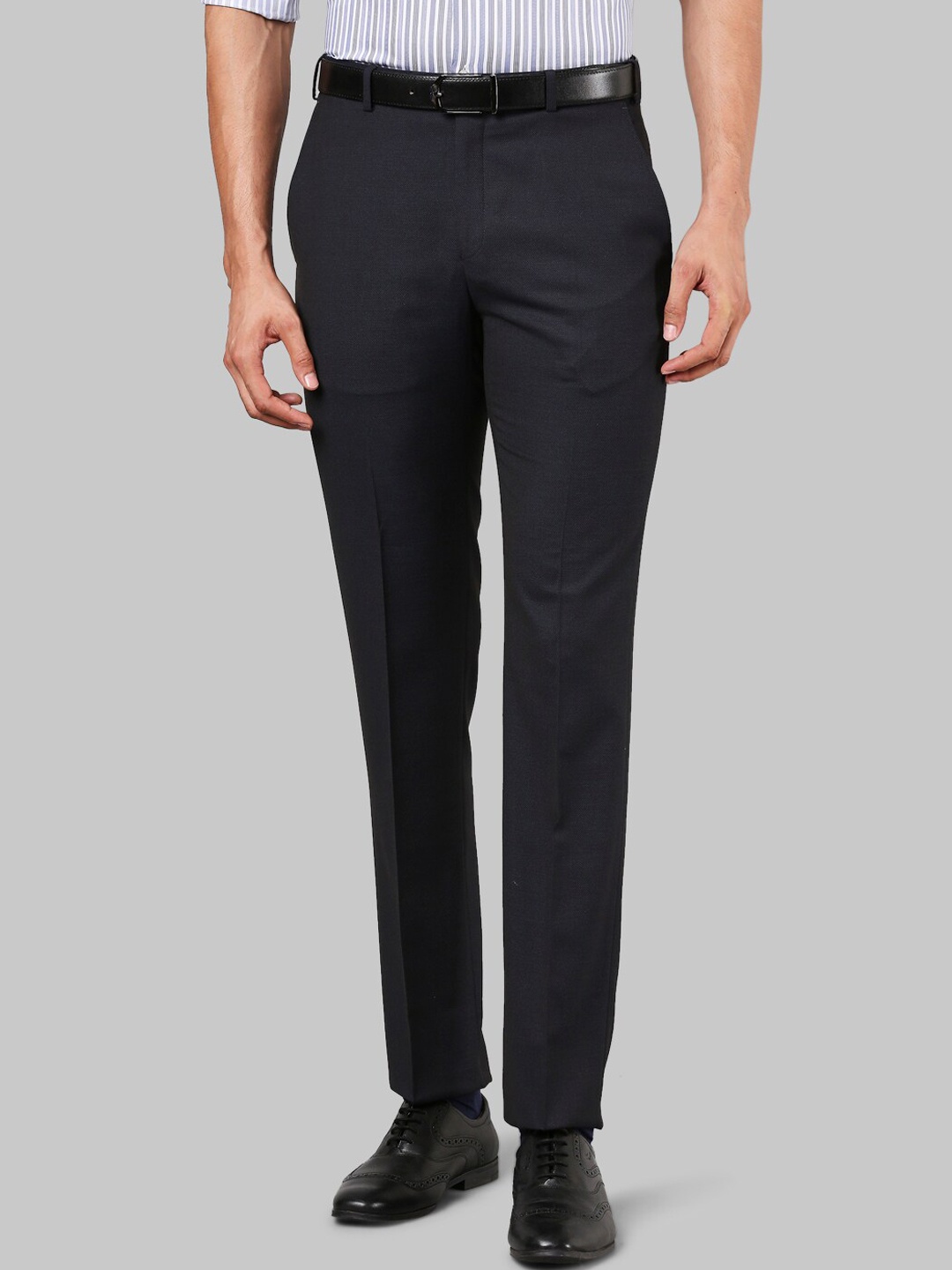 

Raymond Men Dark Blue Solid Regular Fit Trousers