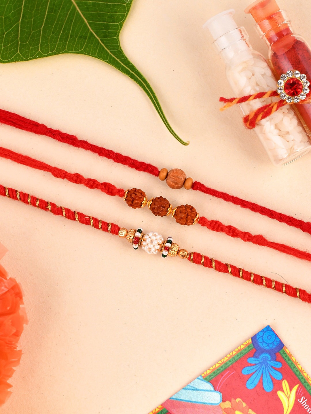 

Shoshaa Men Set Of 3 Red & Gold-Toned Beaded Combo Bhai Rakhi