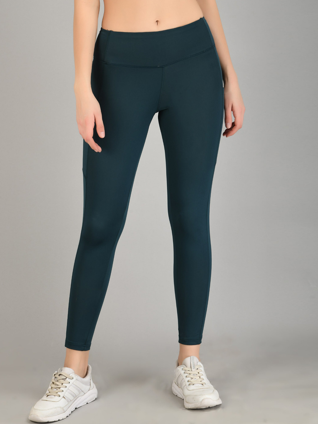 

FITLETHICS Women Green Solid Tights