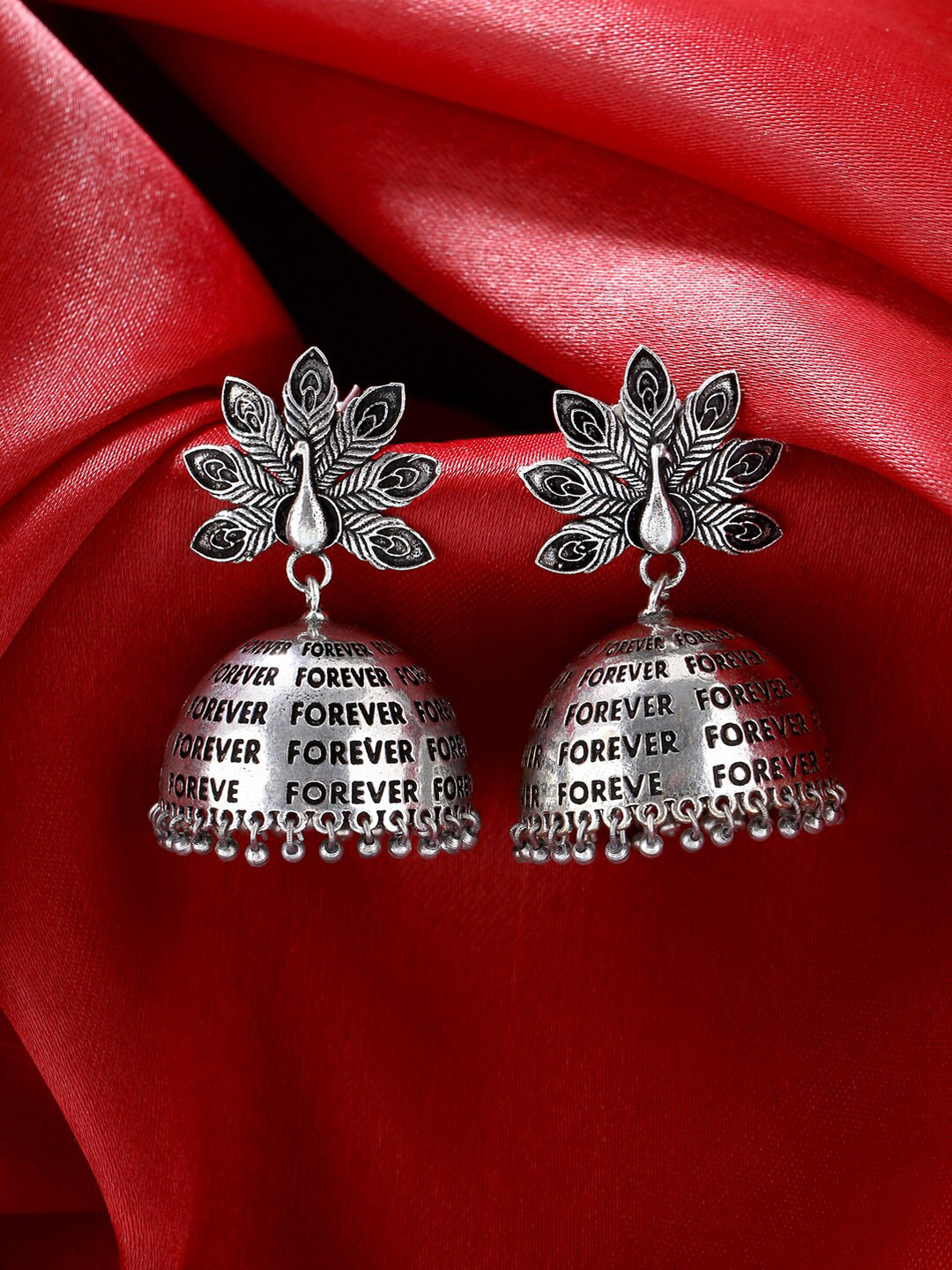

kashwini Silver-Toned Peacock Shaped Jhumkas Earrings