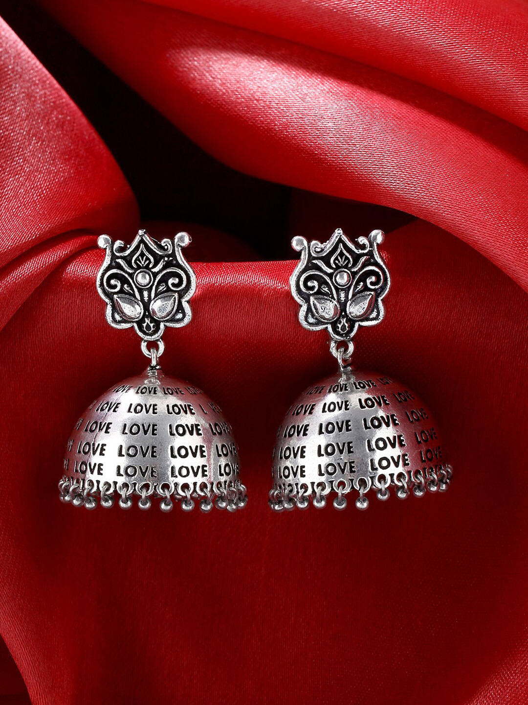 

kashwini Silver-Toned Contemporary Jhumkas Earrings