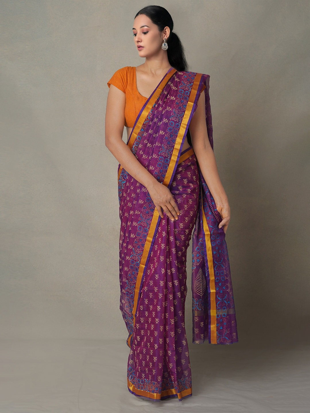 

Unnati Silks Purple & Gold-Toned Ethnic Motifs Zari Pure Silk Kota Saree