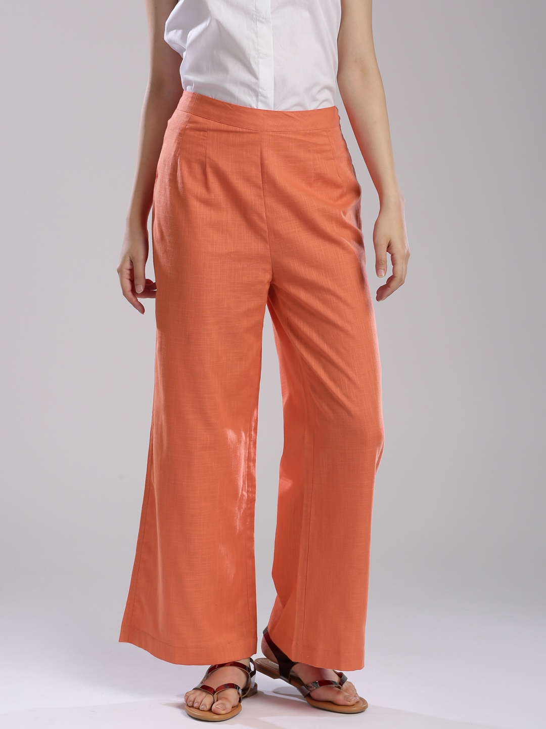 

Fabindia Women Orange Solid Wide Leg Palazzos