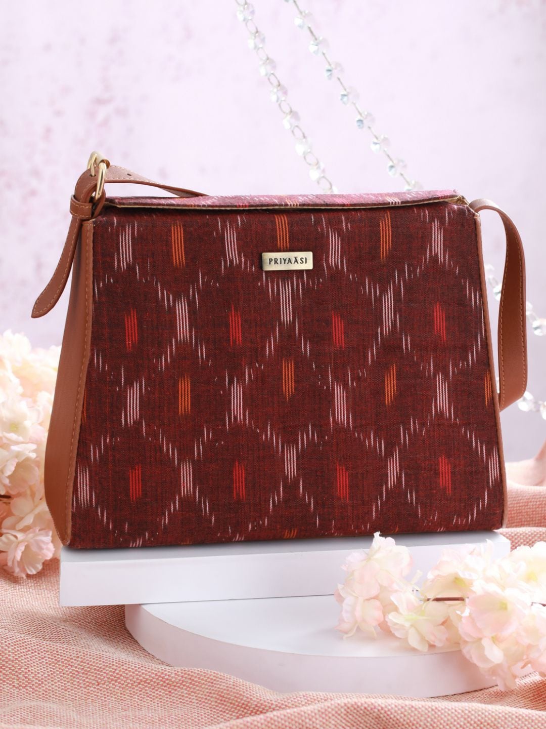 

Priyaasi Maroon PU Structured Ikkat Print Shoulder Bag