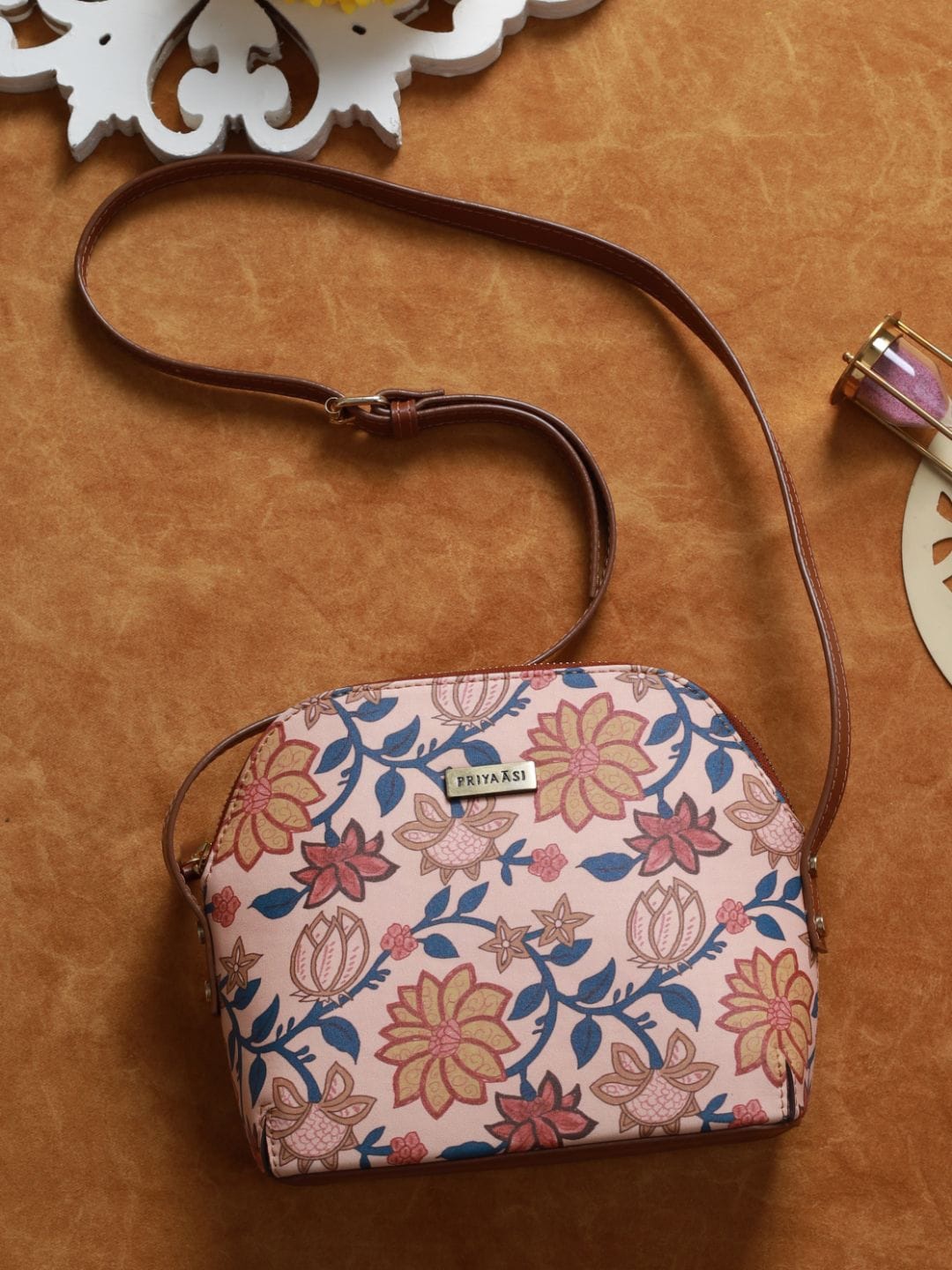 

Priyaasi Women Peach-Coloured Floral Printed PU Structured Sling Bag