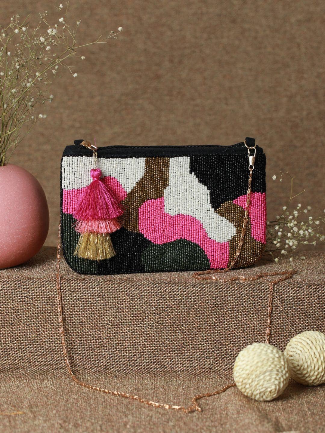 

Priyaasi Beaded Black and pink clutch Bag with Tasselled