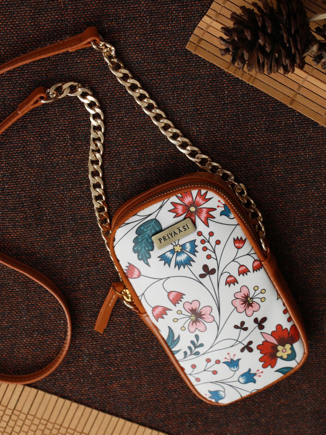 

Priyaasi White Floral Printed Structured Sling Bag