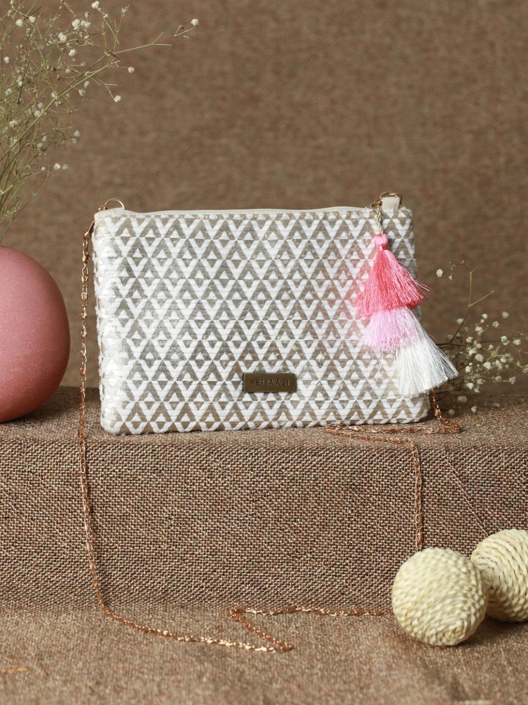 

Priyaasi White Structured Sling Bag with Tasselled
