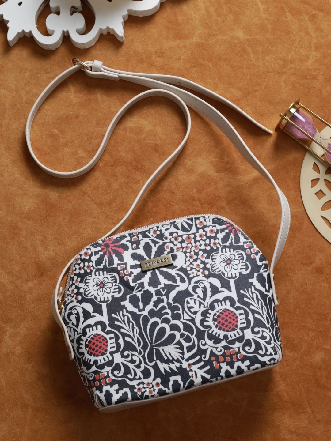 

Priyaasi Black Floral Printed PU Sling Bag