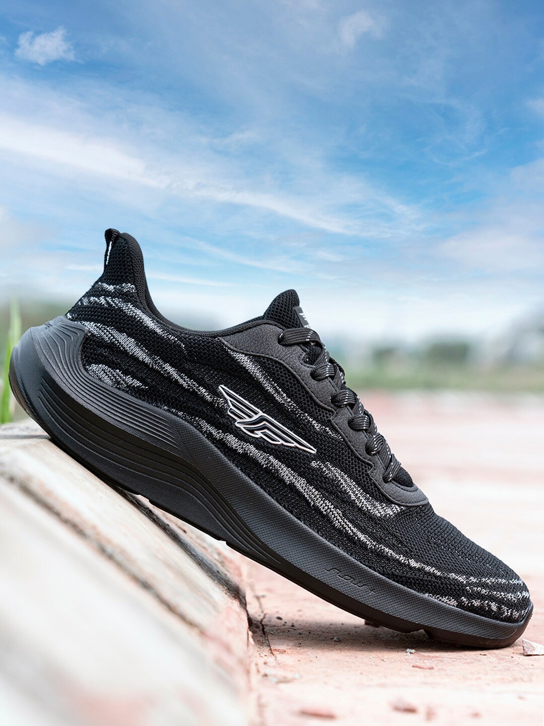 

Red Tape Men Black Textile Running Shoes