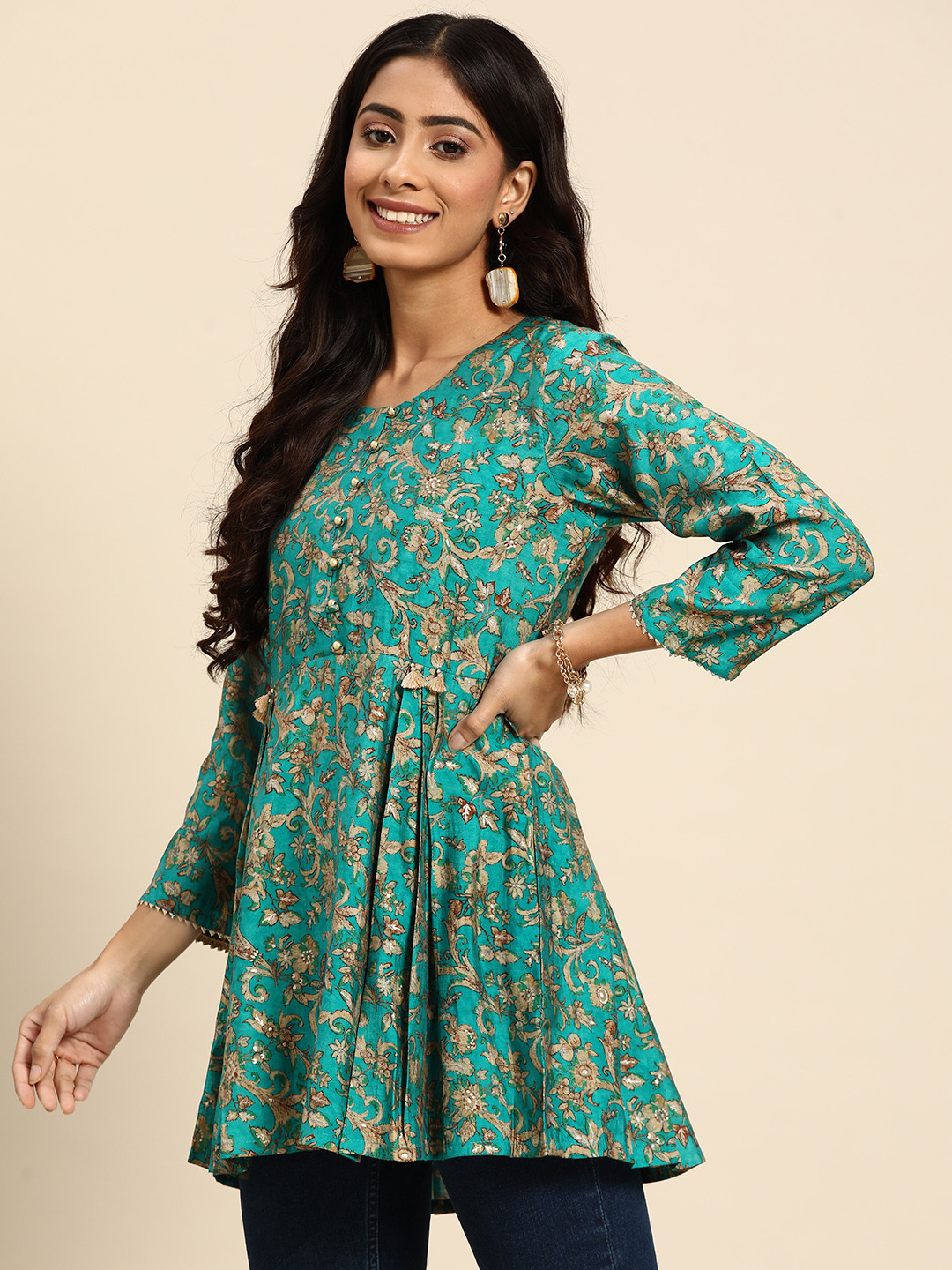 

Sangria Turquoise Blue & Beige Ethnic Motifs Printed Tunic