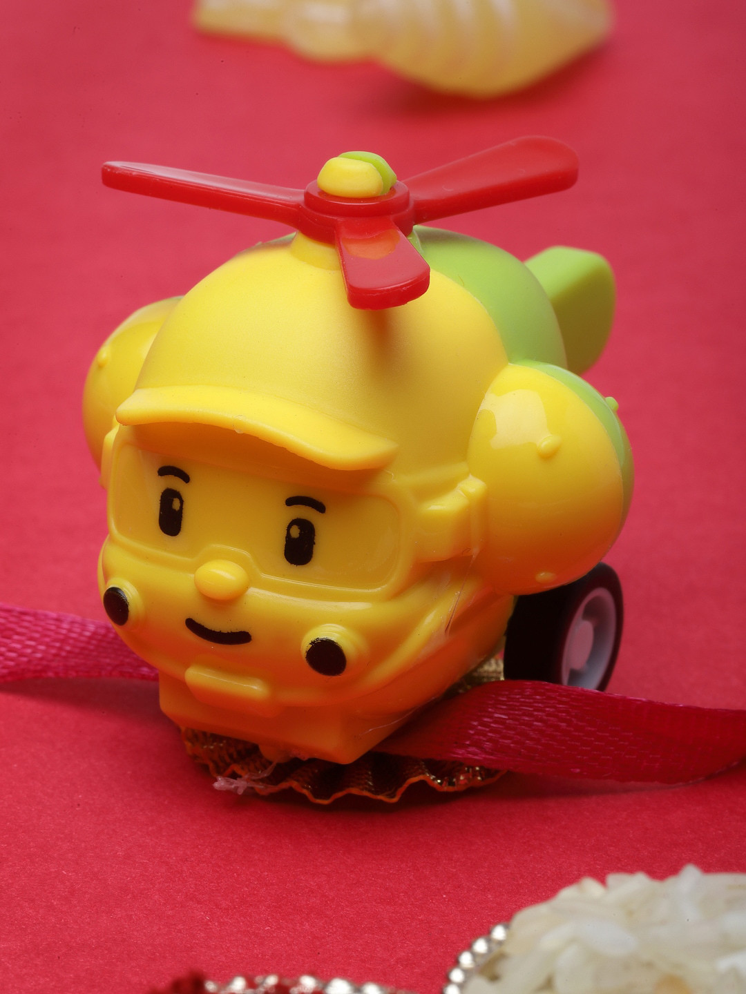 

PANASH Yellow Helicopter-Shaped Toy Rakhi