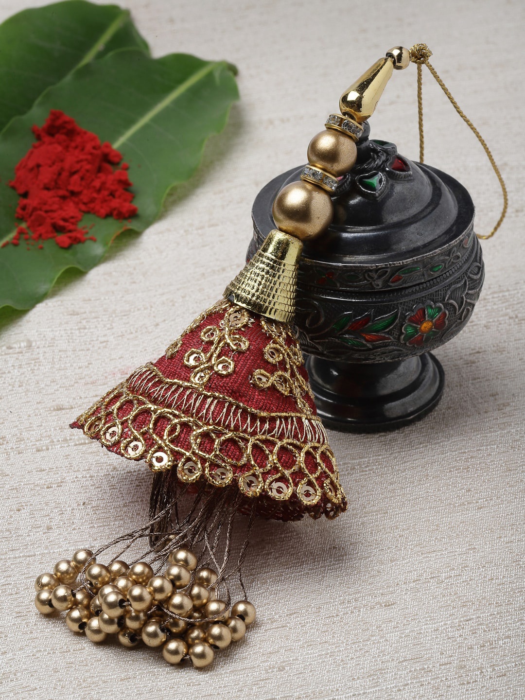 

PANASH Women Gold-Toned Handcrafted Lumba Rakhi With Roli Chawal