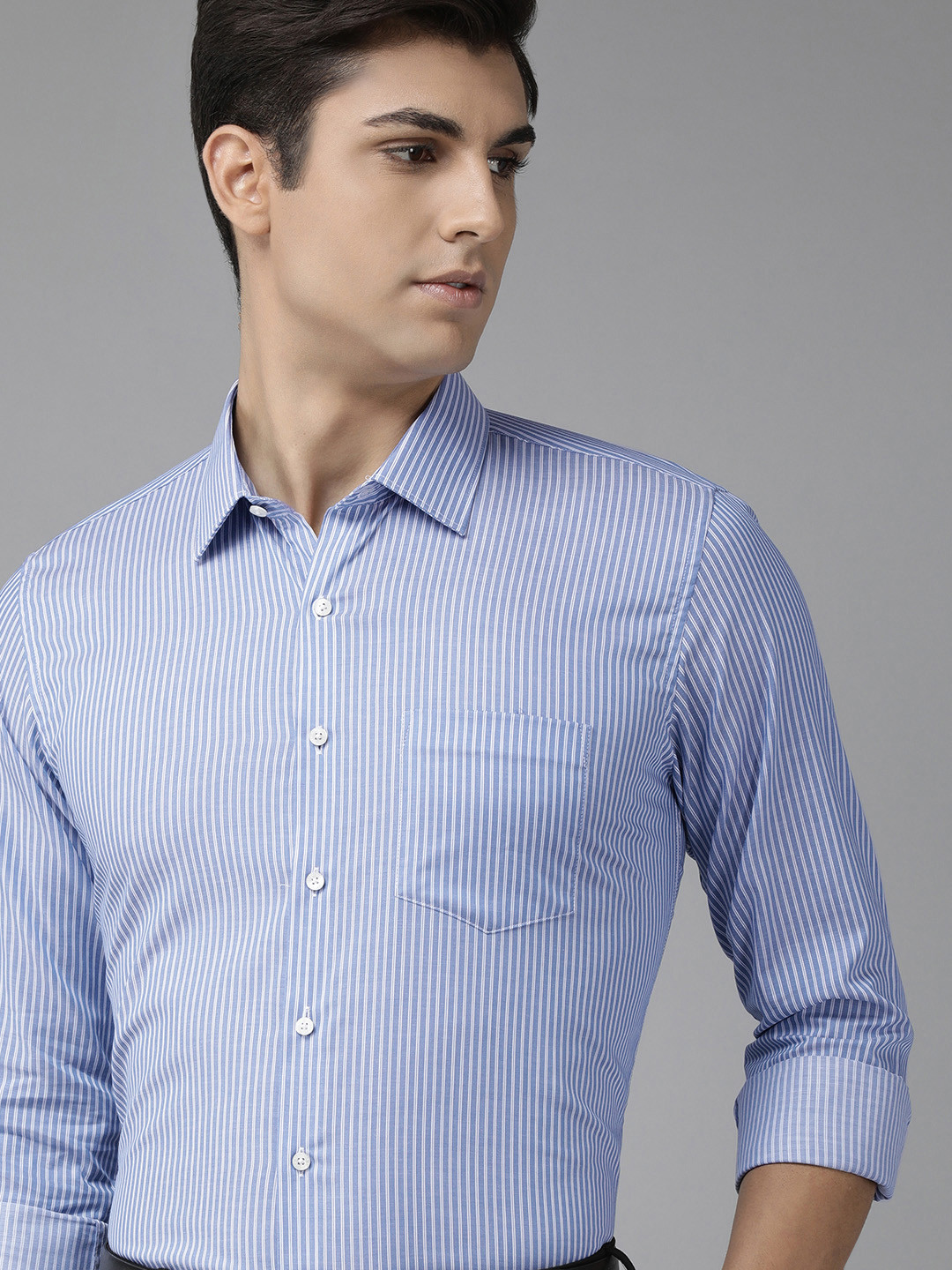 

Van Heusen Men Blue Slim Fit Vertical Stripes Opaque Formal Shirt With Chest Pocket