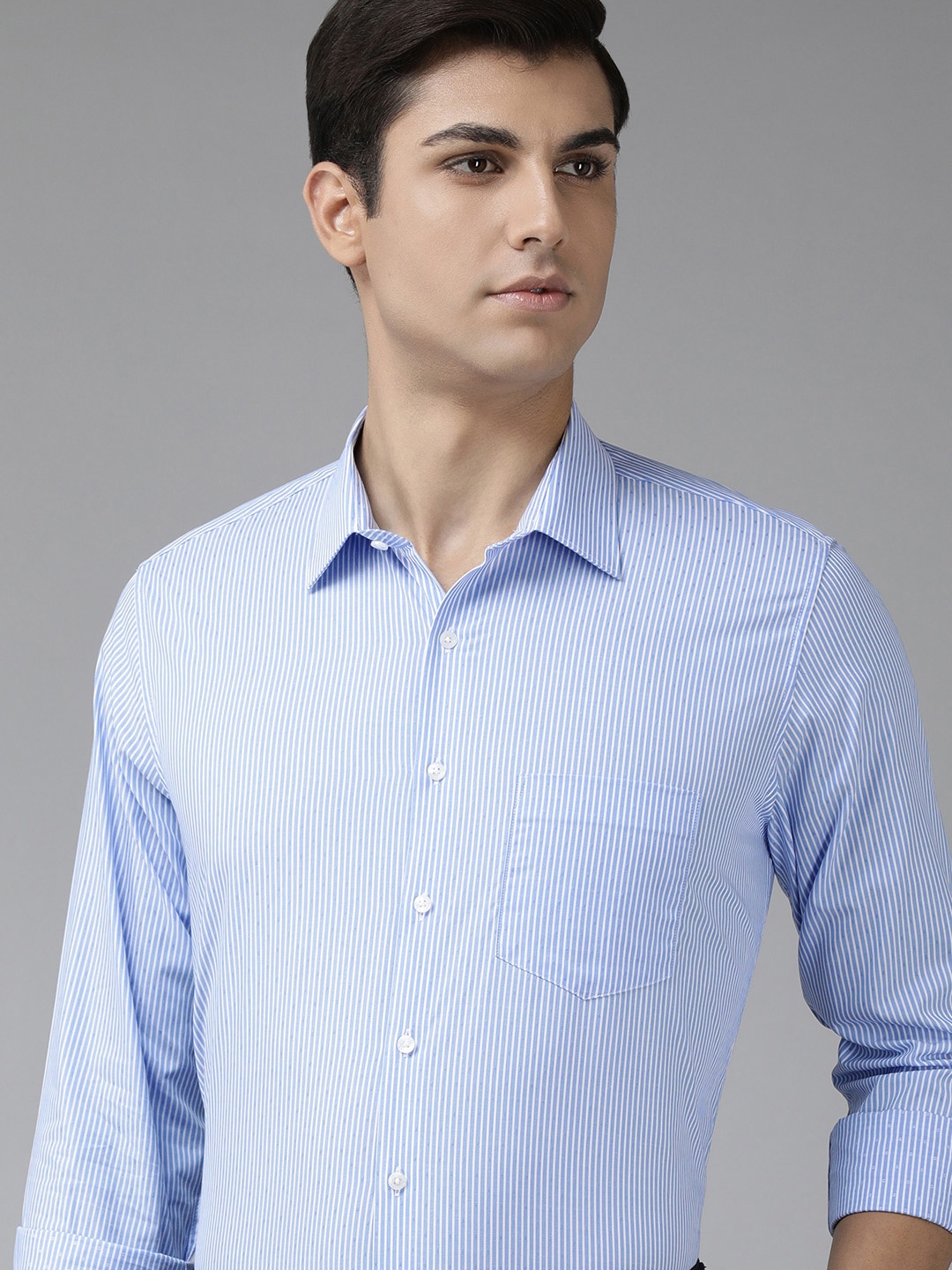 

Van Heusen Men Blue Slim Fit Vertical Stripes Pure Cotton Formal Shirt