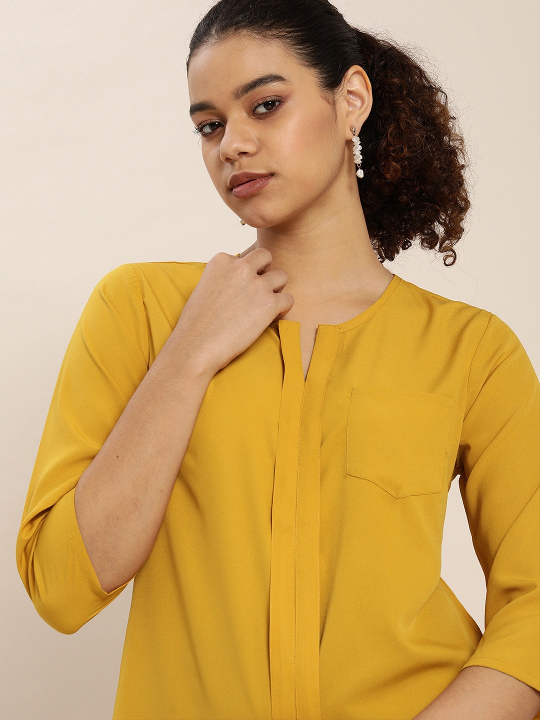 

encore by INVICTUS Mustard Yellow Solid Round Neck Pocket Detailing Regular Top