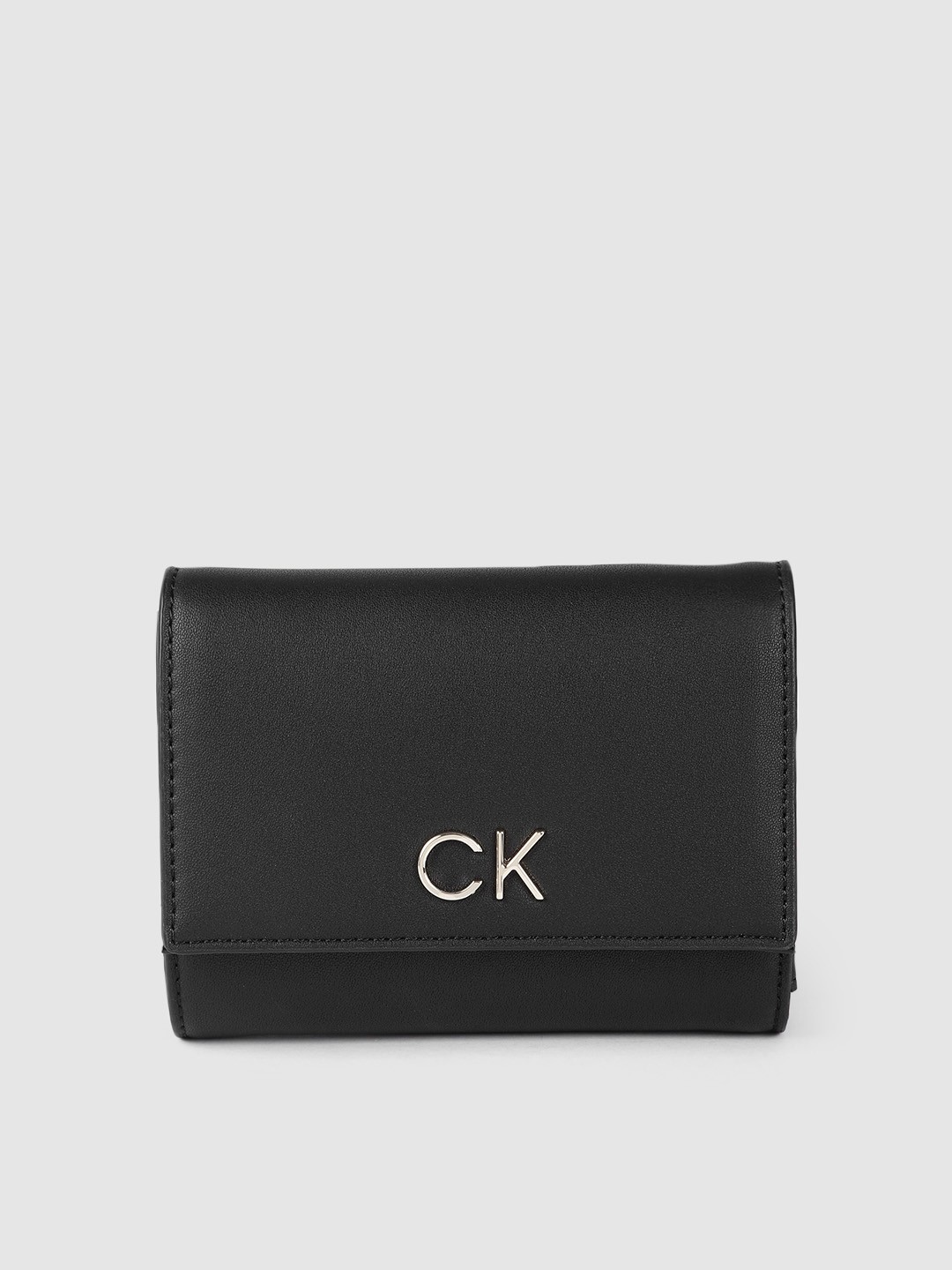 

Calvin Klein Jeans Women Black Solid Three Fold Wallet