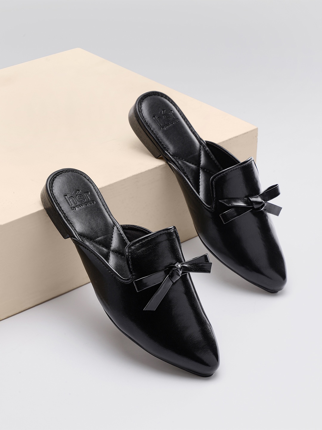 

her by invictus Women Black Solid Mules with Bow Detail