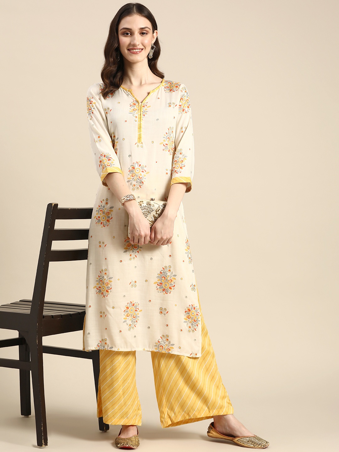 

Sangria Women Beige & Yellow Ethnic Motifs Print Kurta with Palazzos