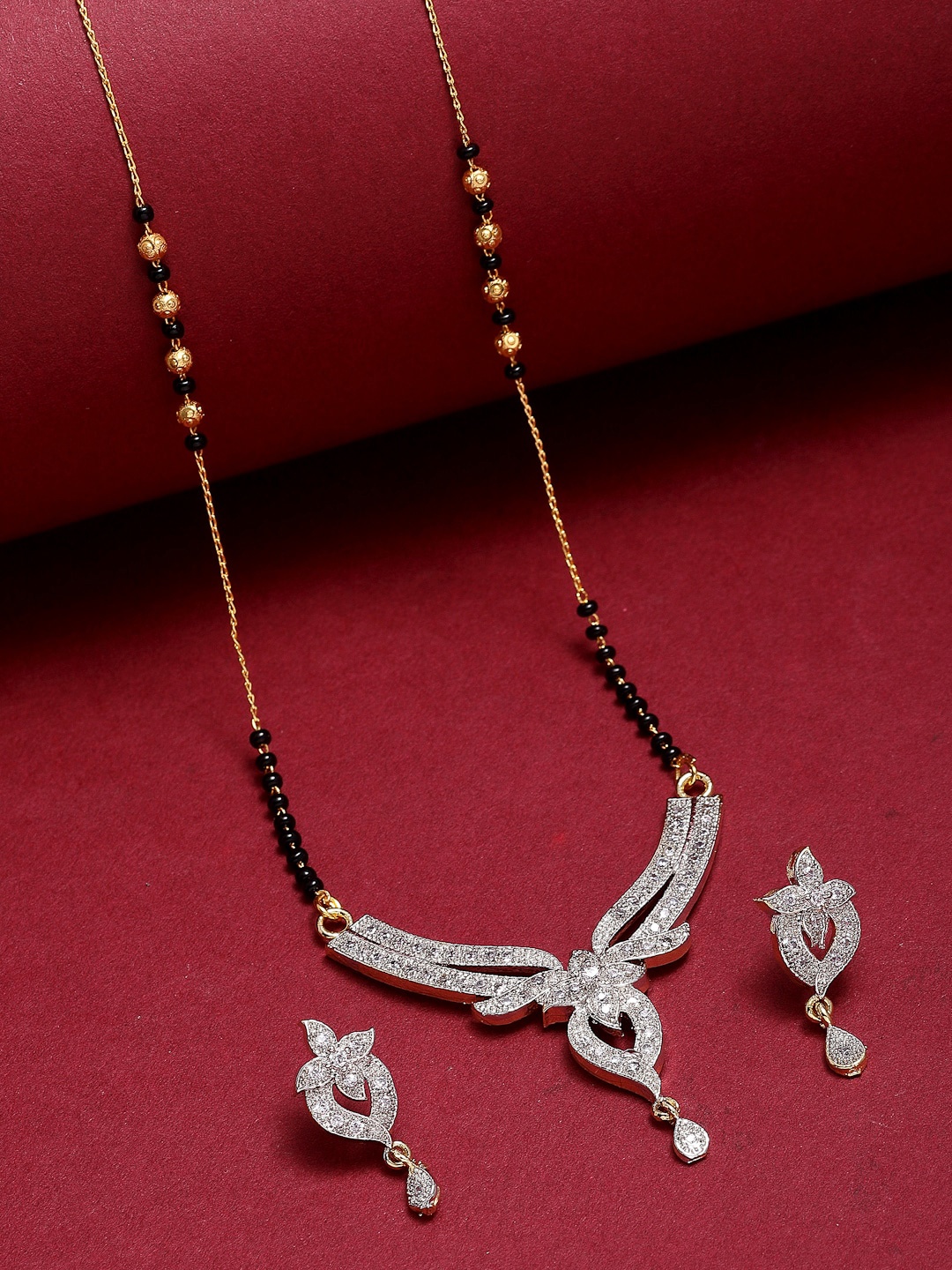 

ZENEME Gold Plated Black Beaded white AD-Stone Studded Mangalsutra