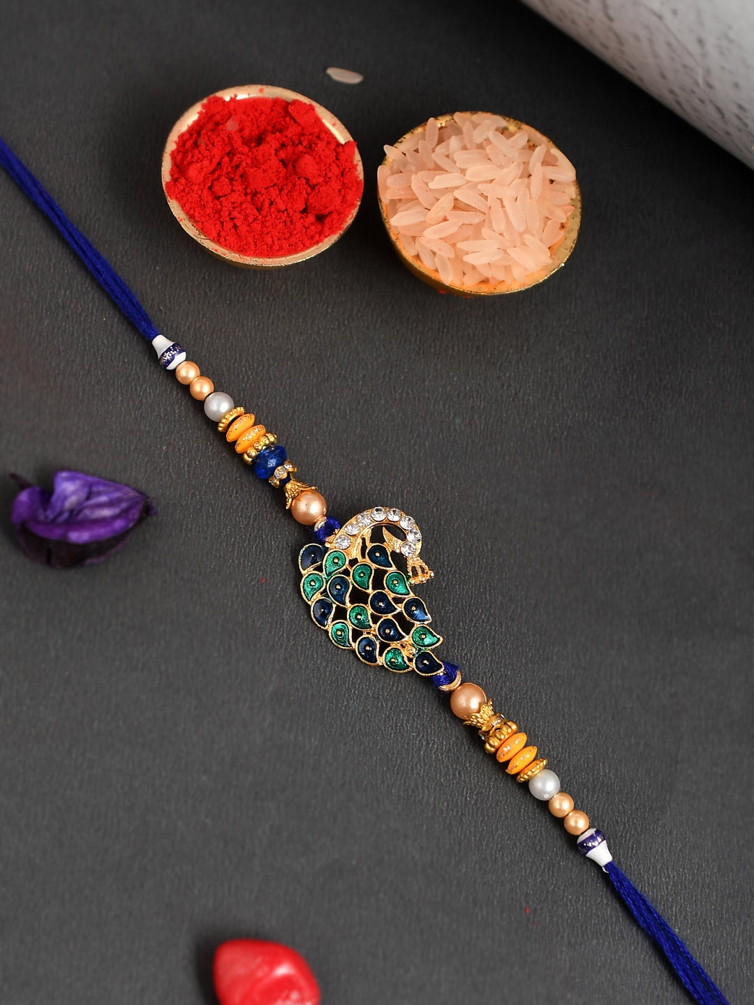 

Shoshaa Men Blue Peacock Shaped-Studded Rakhi