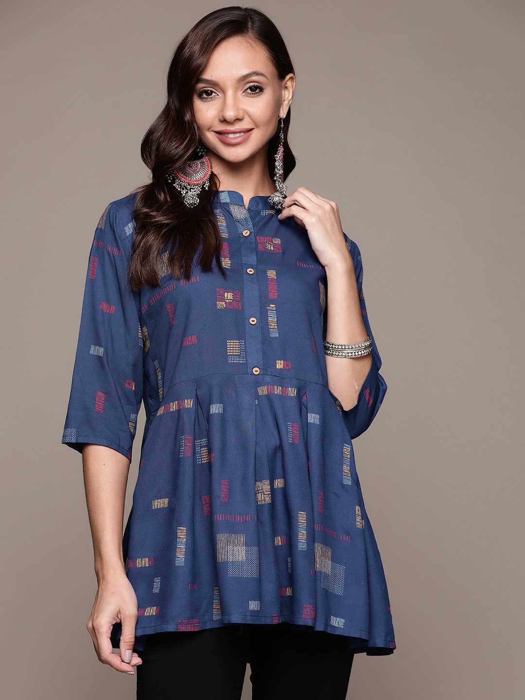 

Anubhutee Blue Geometric Printed Empire Kurti
