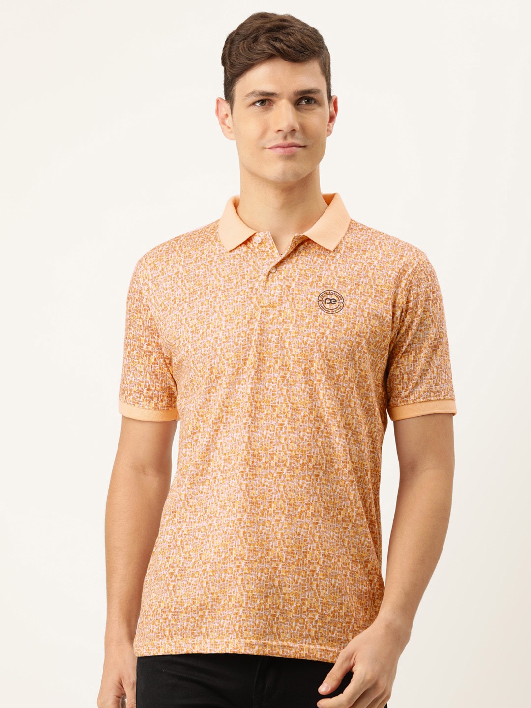 

Peter England Men Orange & White Checked Polo Collar T-shirt
