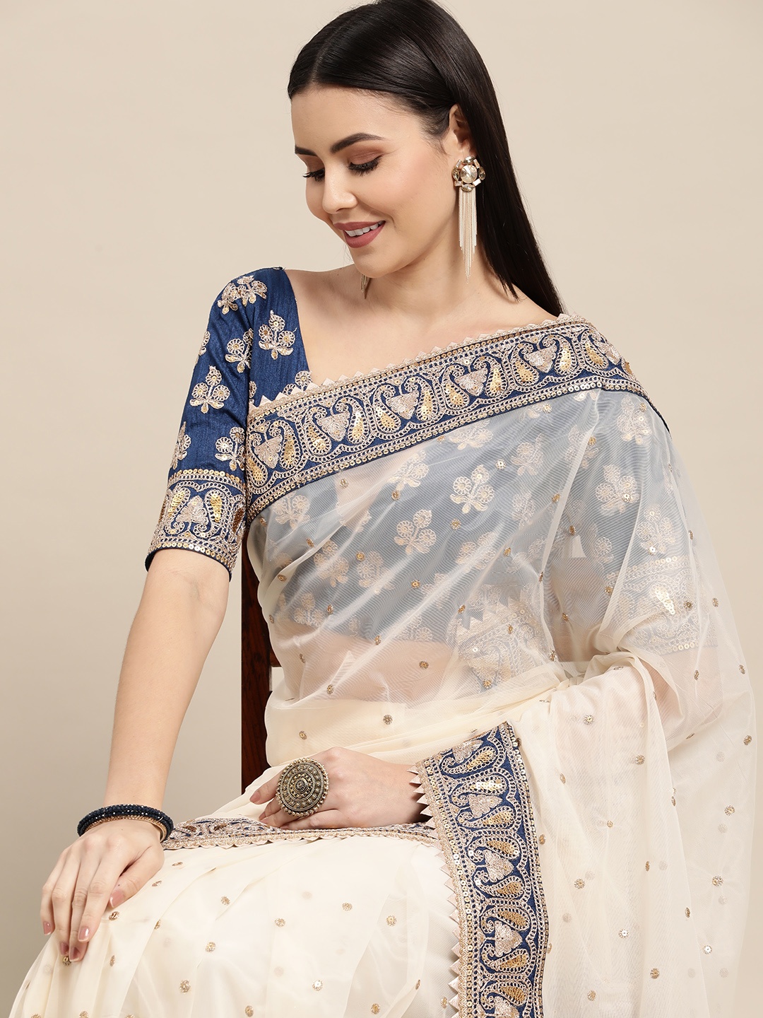 

LOOKNBOOK ART Off White & Navy Blue Embroidered Sequined Net Saree with Blouse Piece
