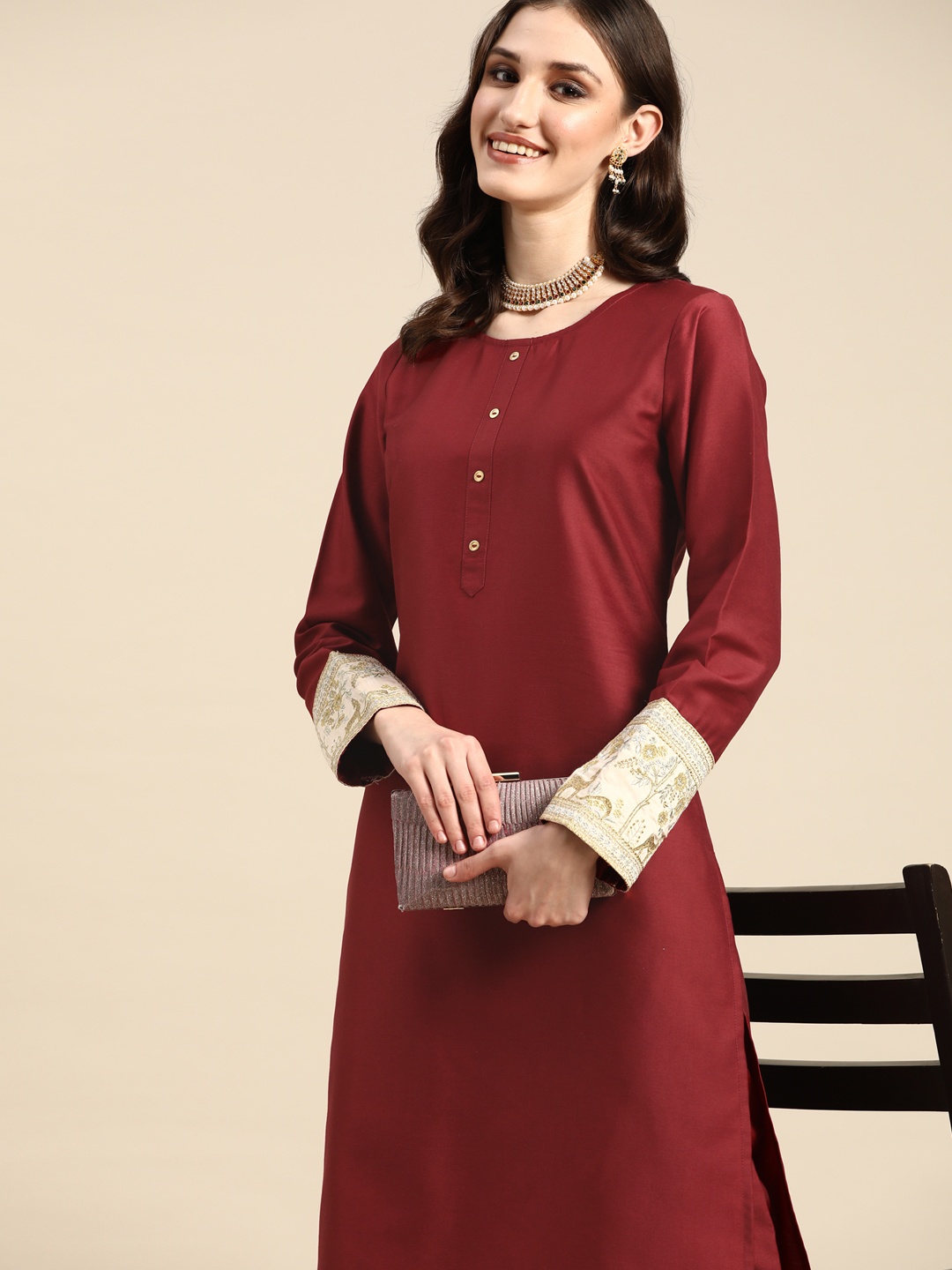 

Sangria Women Maroon Solid Kurta with Trousers
