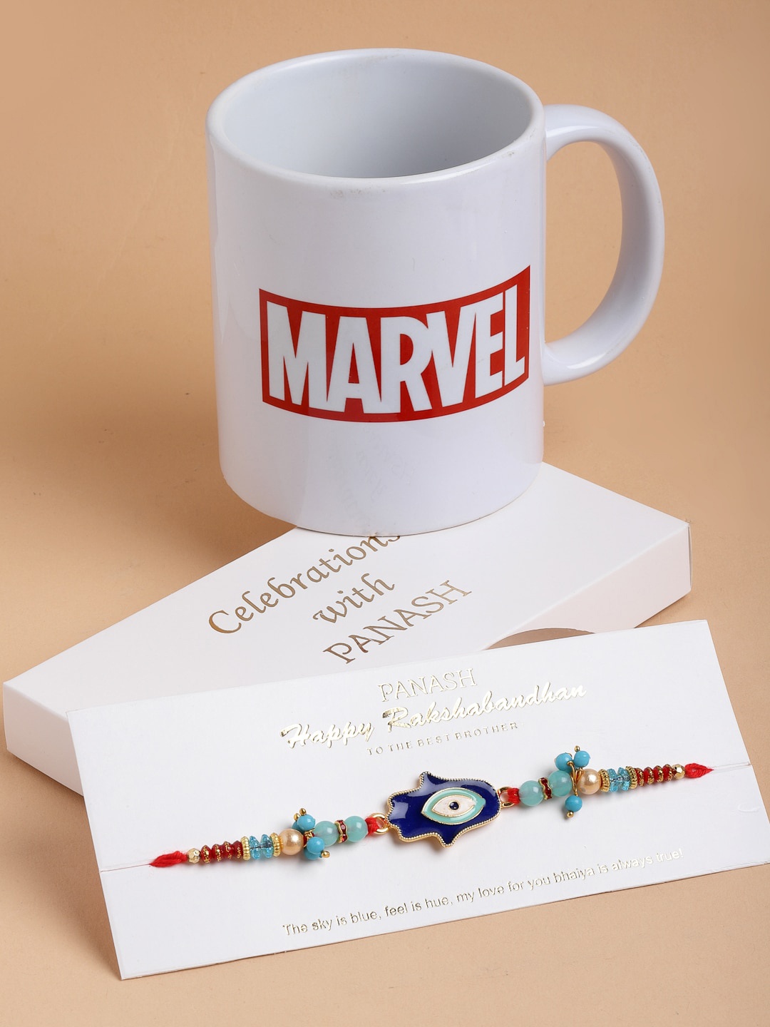 

PANASH Blue & Red Evil Eye Beaded Rakhi With Marvel Mug Gift Set