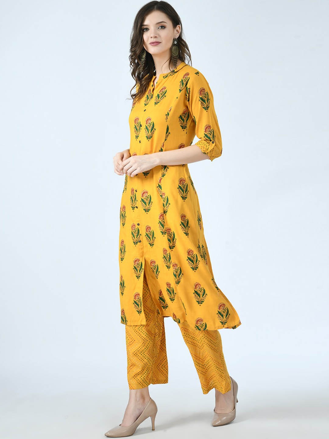 

MAFE Women Mustard Yellow Floral Pleated Kurti with Trousers
