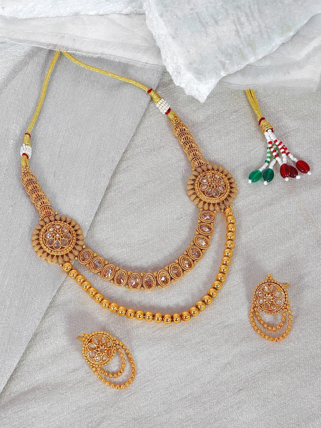 

Crunchy Fashion Gold-Plated White Stone-Studded Enamelled Layered Jewellery Set