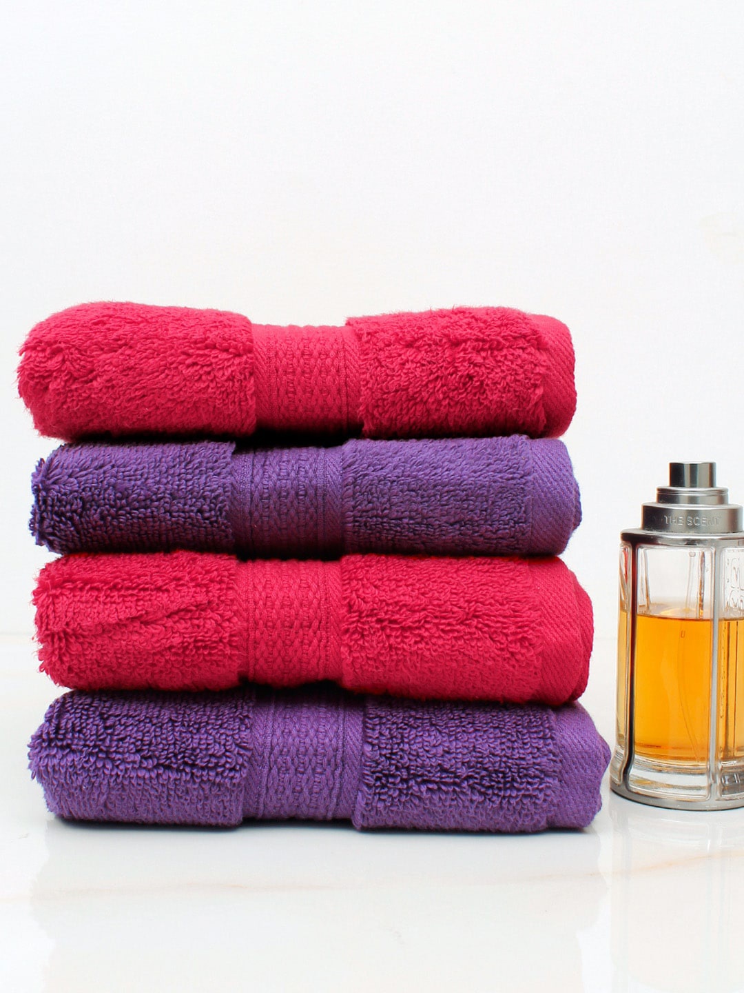 

AVI Living Set Of 4 Purple & Red Solid 550 GSM Cotton Hand Towels