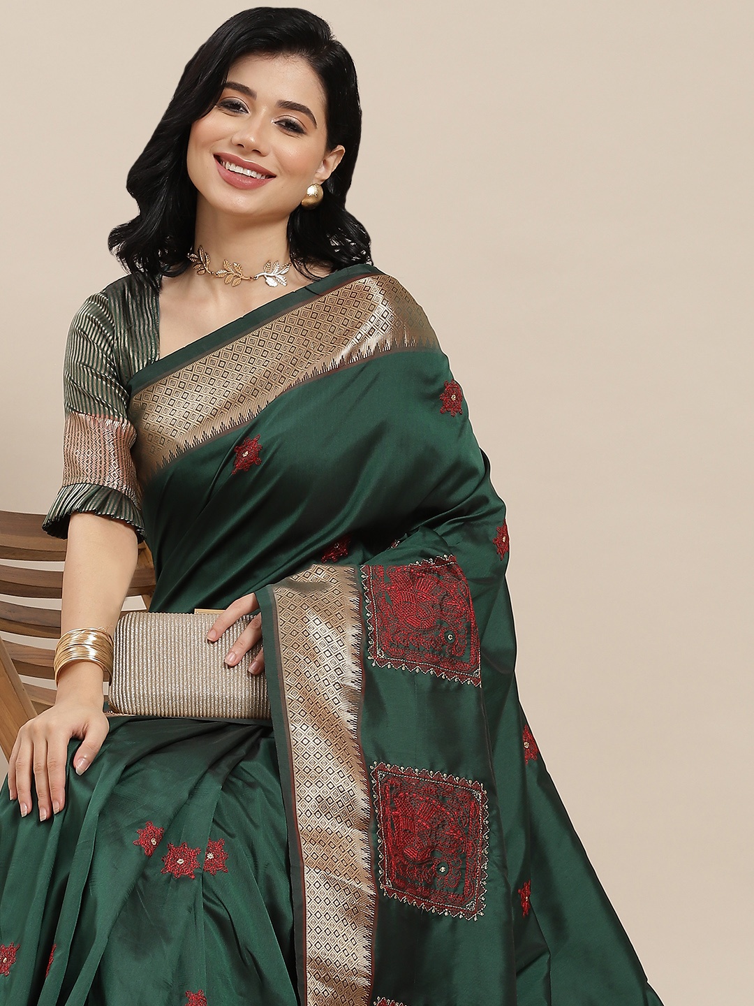 

RAJGRANTH Green & Golden Ethnic Motifs Embroidered Saree