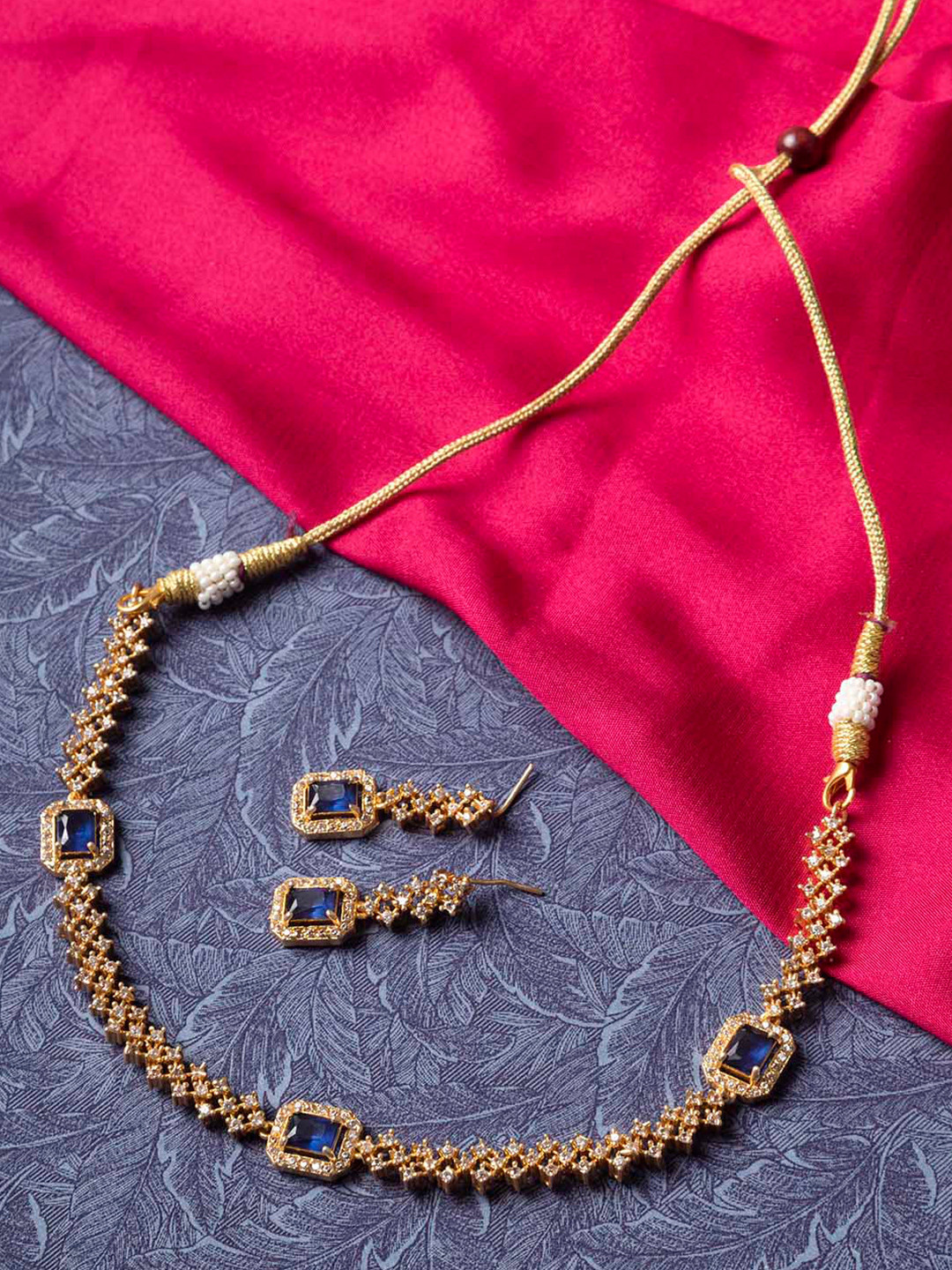 

StileAdda Gold-Plated Blue American Diamond Studded Necklace Set
