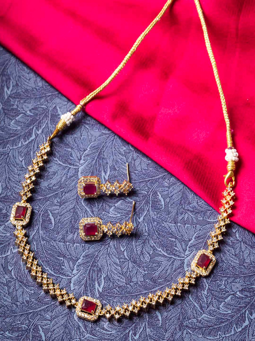 

StileAdda Brass-Plated Red AD Stone-Studded & Beaded Jewellery Set