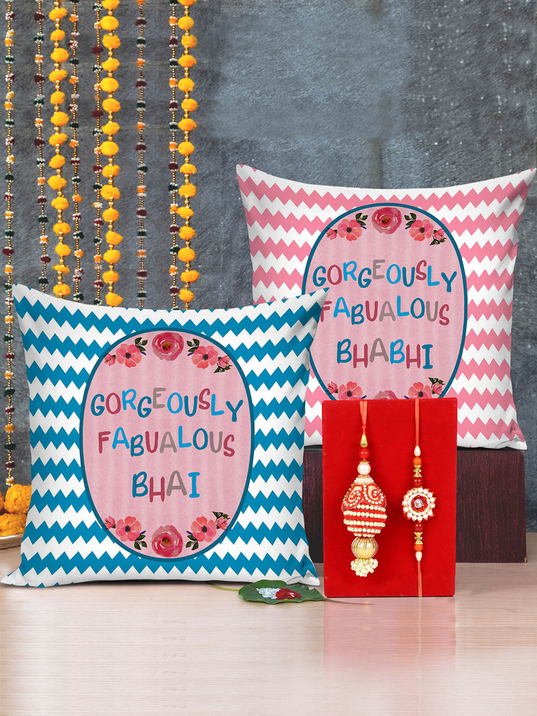 

TIED RIBBONS Bhaiya Bhabhi Rakhi Set with Set of 2 Printed Cushion Combo Gift Set, Multi