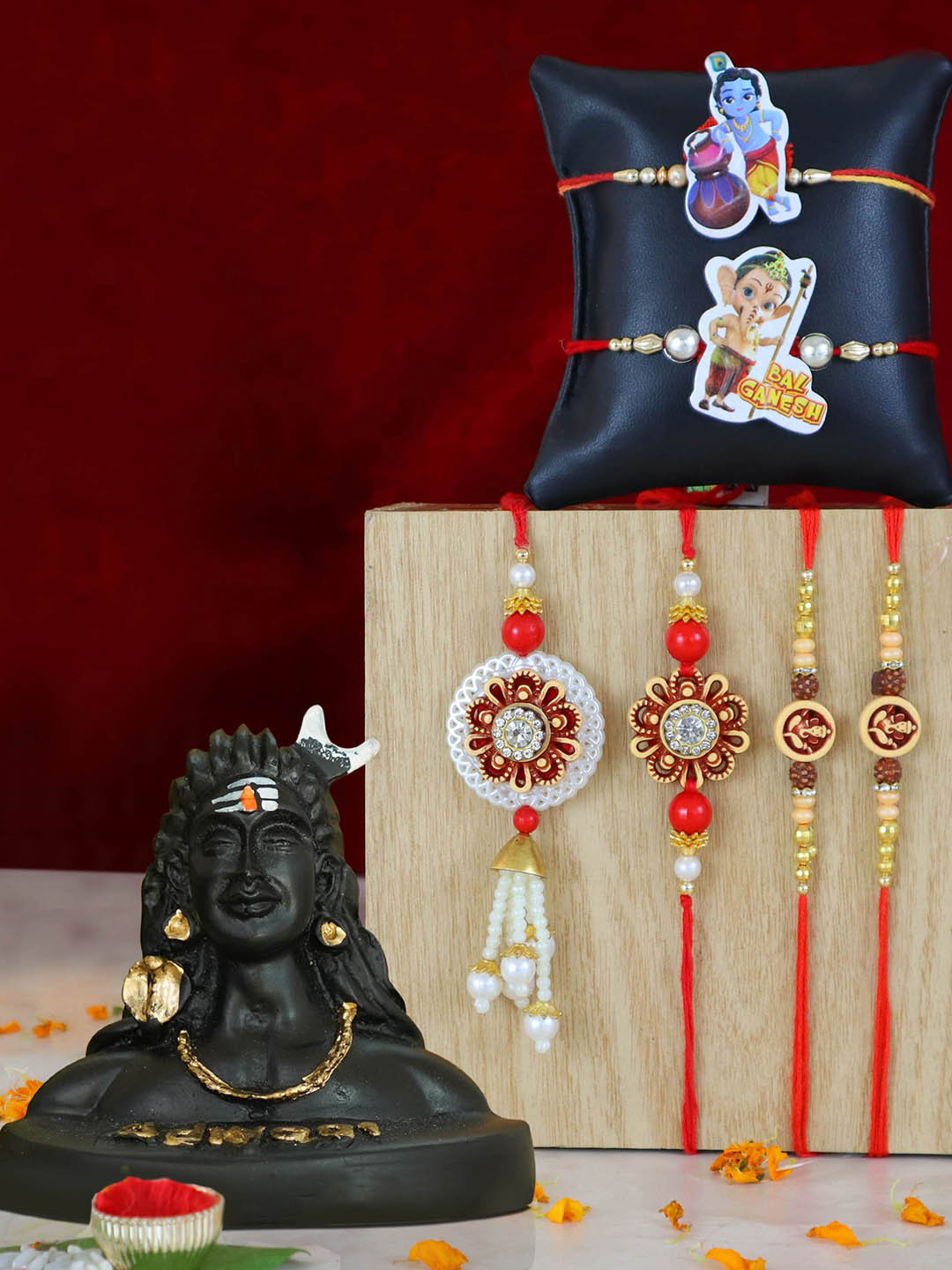 

TIED RIBBONS Set of 6 Rakhi for Bhaiya Bhabhi Kids with Adiyogi Shiva Idol Gift Set, Multi