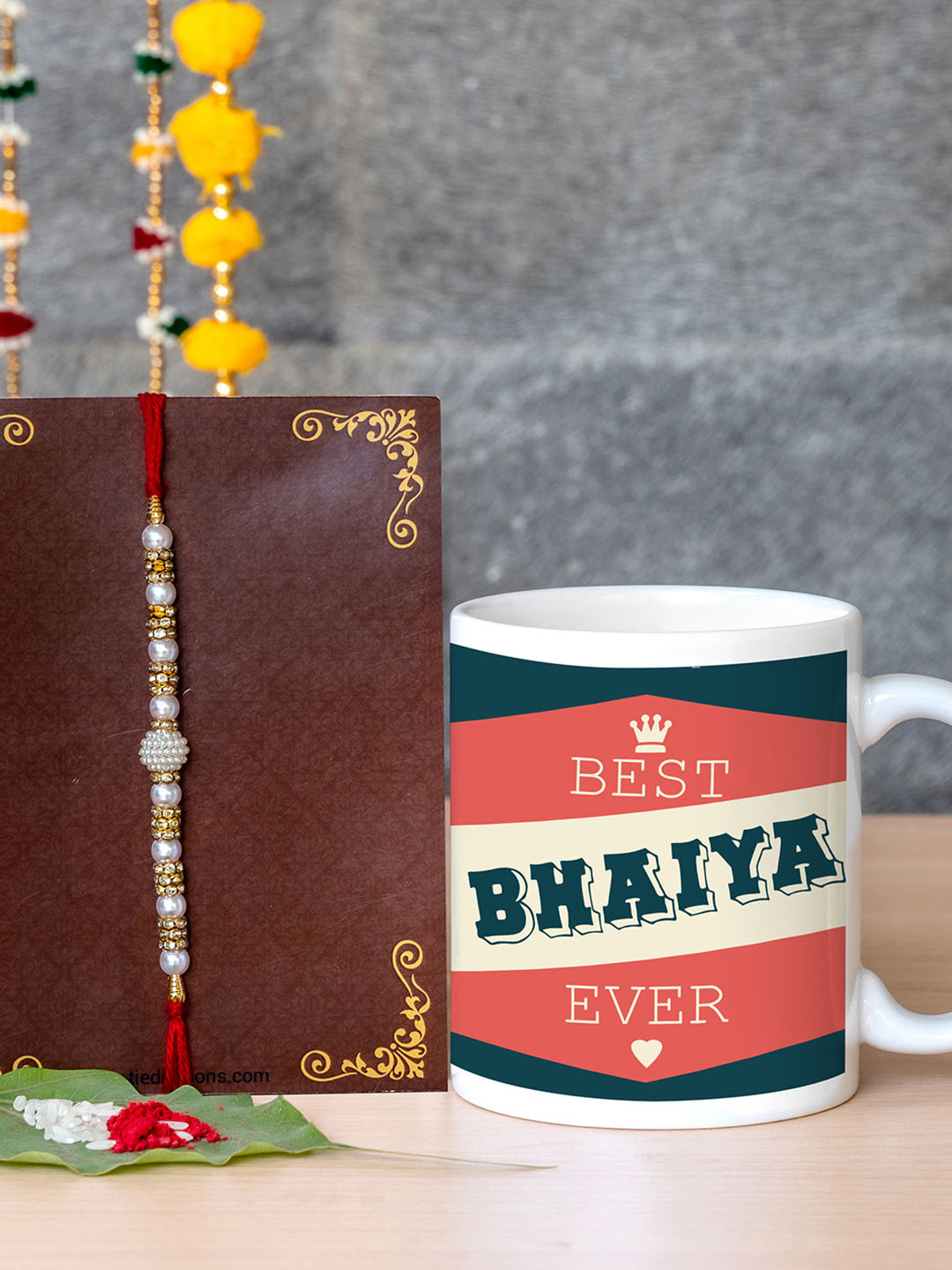 

TIED RIBBONS Rakhi With Printed Coffee Mug Combo Gift Set, Silver
